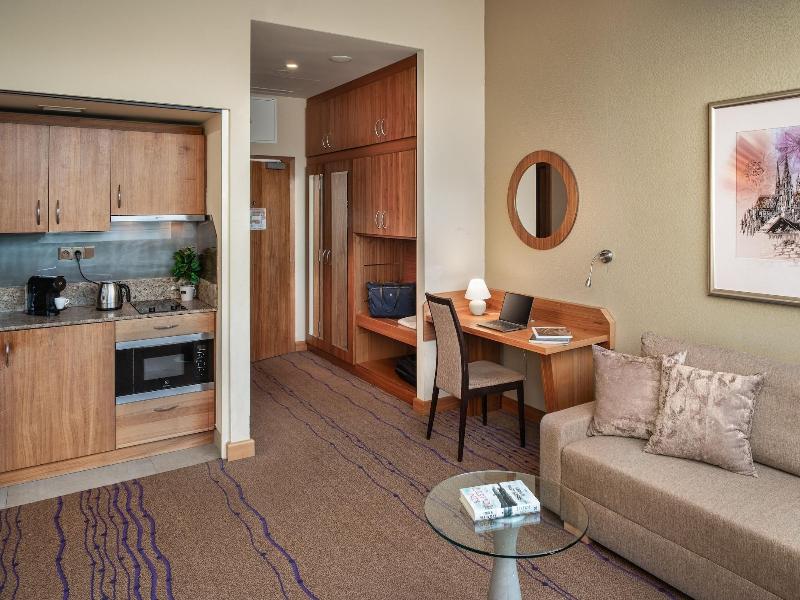 Monarch Apartments By Adrez Living image