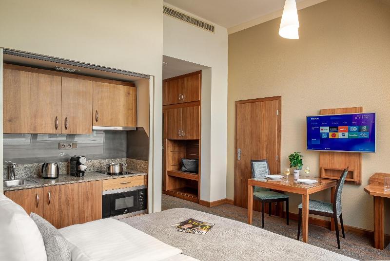 Monarch Apartments By Adrez Living image