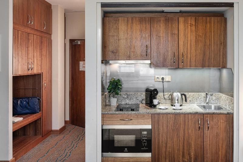 Monarch Apartments By Adrez Living image