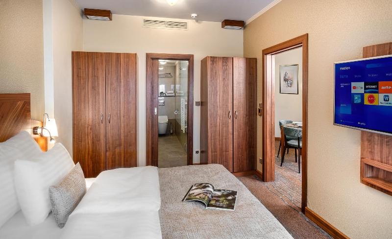 Monarch Apartments By Adrez Living image