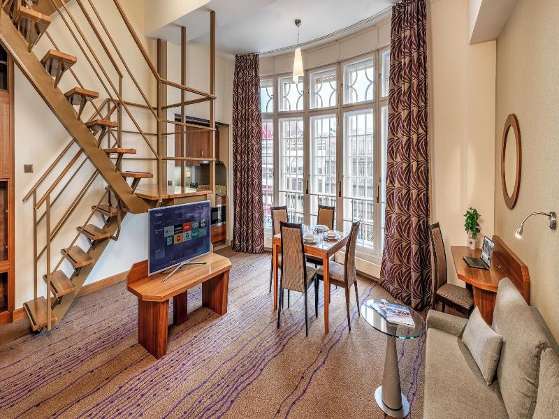 Monarch Apartments By Adrez Living image