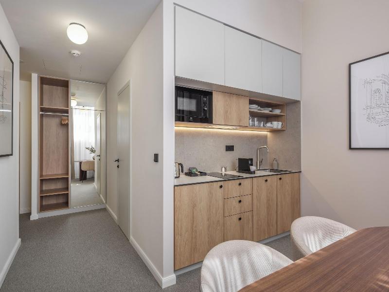 Monarch Apartments By Adrez Living image