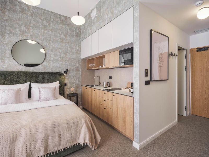 Monarch Apartments By Adrez Living image
