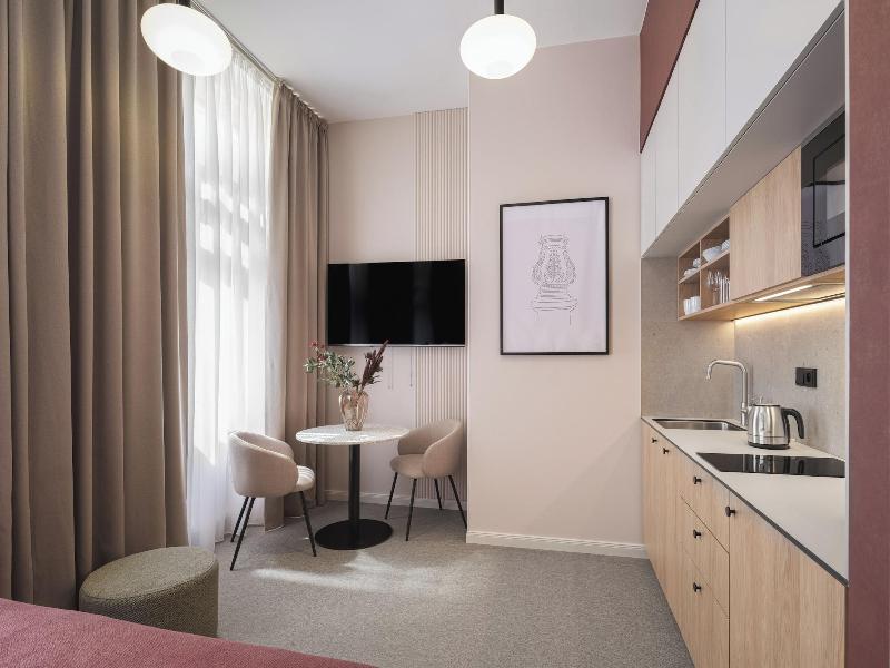 Monarch Apartments By Adrez Living image