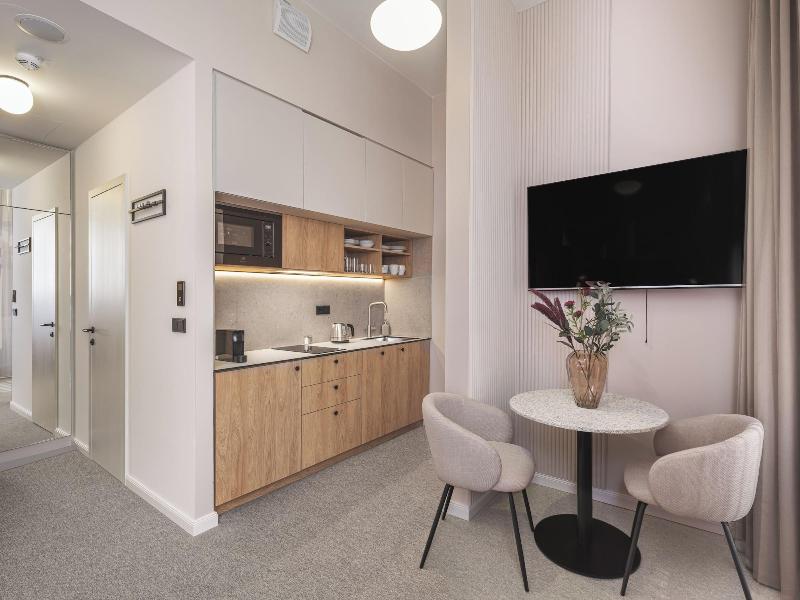 Monarch Apartments By Adrez Living image