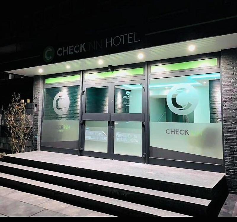 Checkinn Hotel image