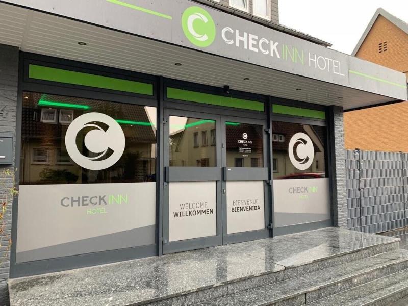 Checkinn Hotel image