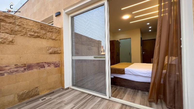Celia Pyramids View Inn image