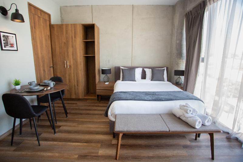Suites Del Carmen image