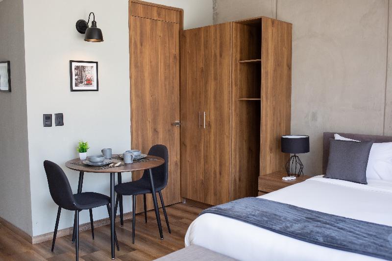 Suites Del Carmen image