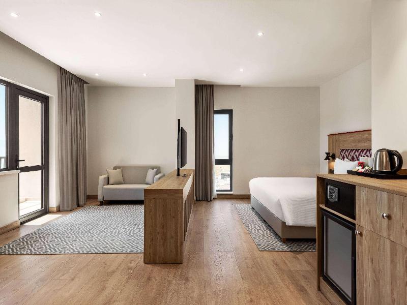 Ramada Encore By Wyndham Zomin image