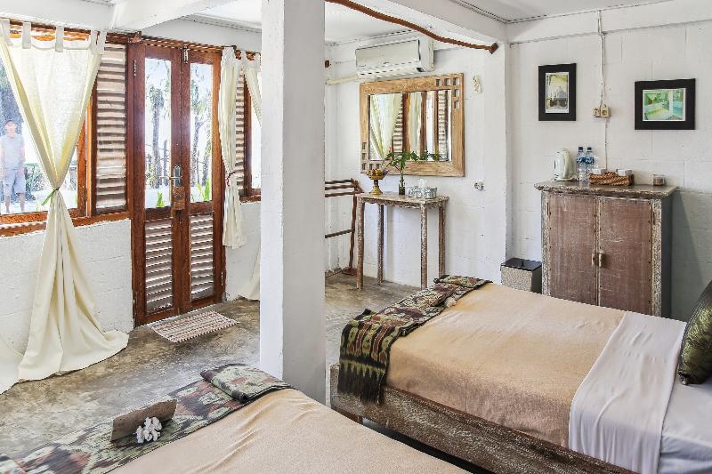 Cemara Beachfront Suite By Zuzu image