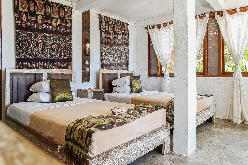 Cemara Beachfront Suite By Zuzu image