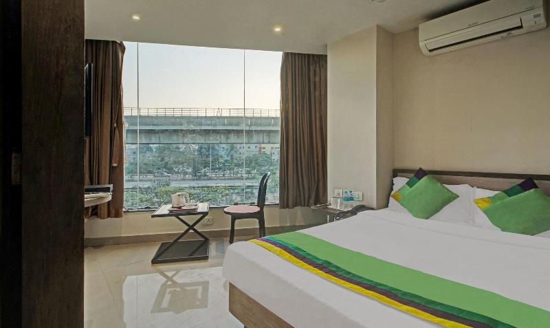 Treebo Glassotel image