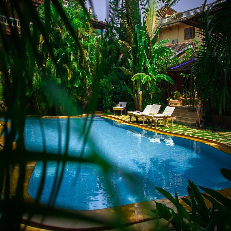 Papa Jolly Eco Resort Near Morjim Beach image