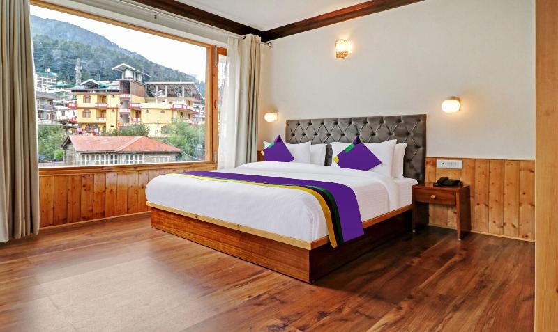 Treebo Premium Sattva With Mountain View image