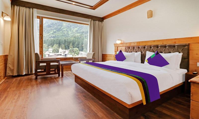 Treebo Premium Sattva With Mountain View image