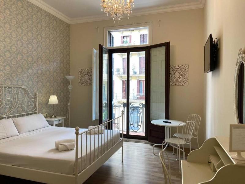 Hostal Lumine Suites By Gaiarooms image
