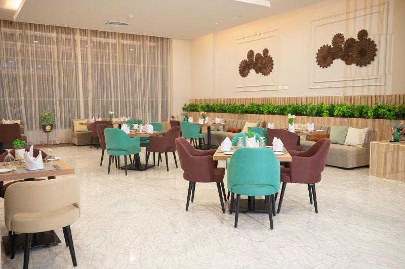 Tolip Hotel Olympic International City image
