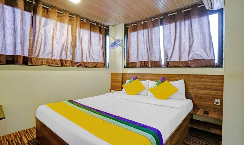 New Harshita Inn By Glitz Hotel image