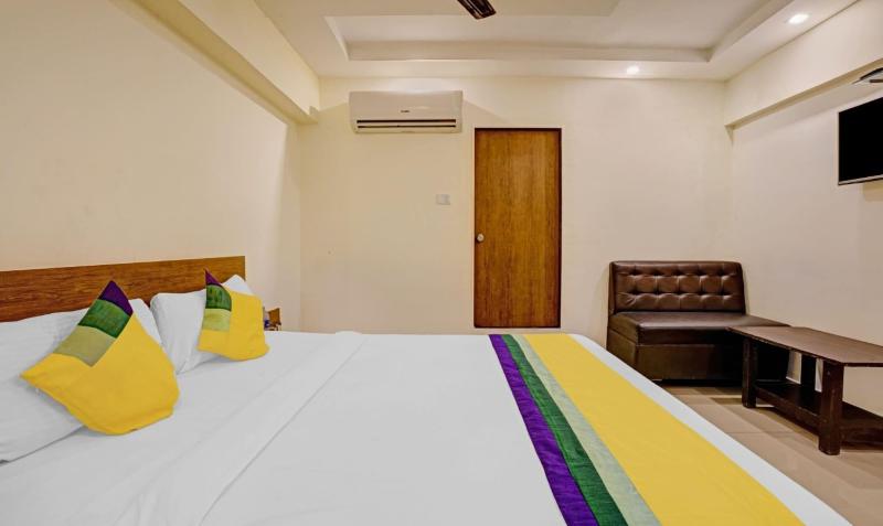 New Harshita Inn By Glitz Hotel image