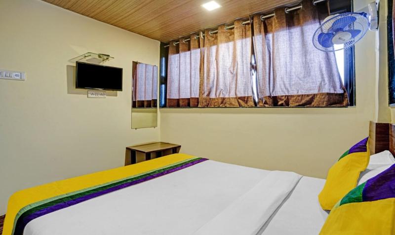 New Harshita Inn By Glitz Hotel image