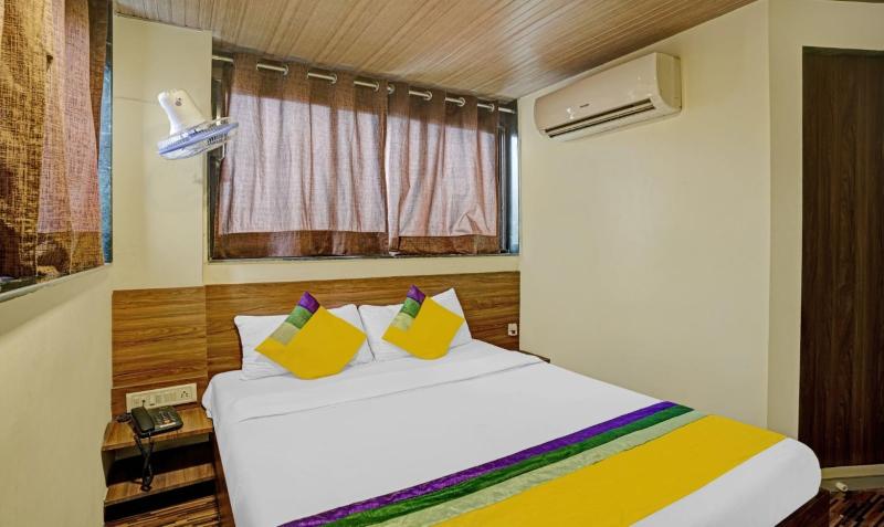 New Harshita Inn By Glitz Hotel image