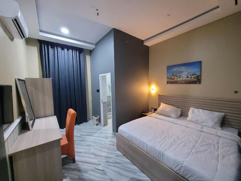 The Charis Hotel And Suites image