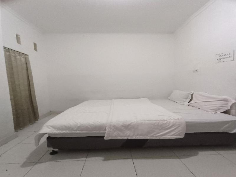 Spot On 92635 Homestay Baiturrahmah Syariah image