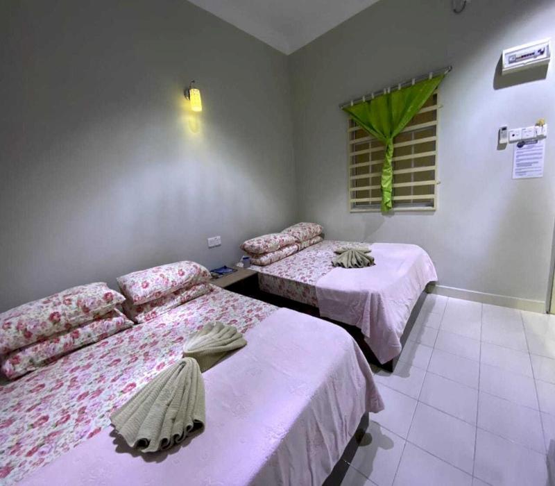 Oyo 91002 D Qamar Motel image