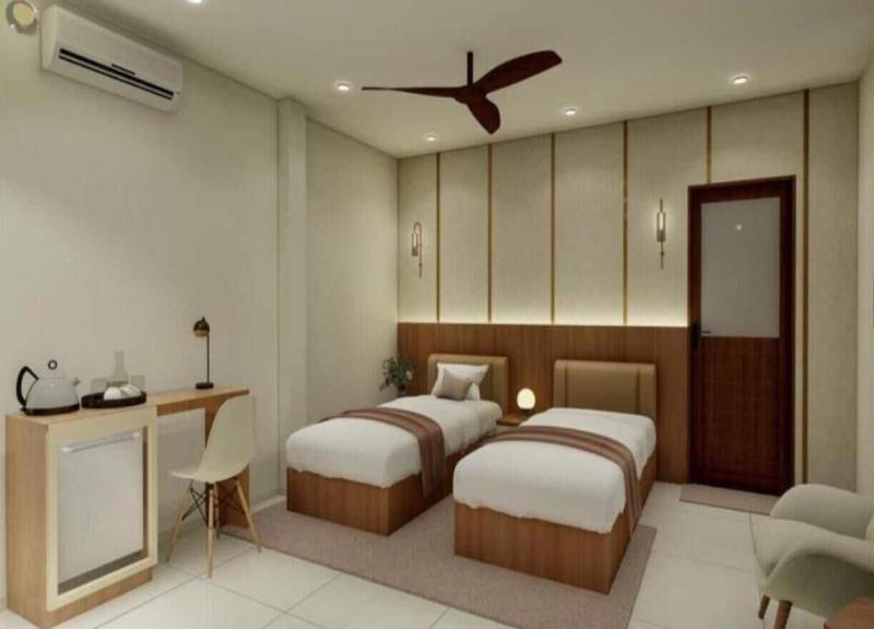 Q One By Glitz Hotels image