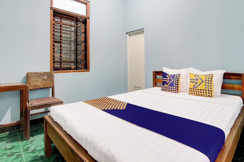 Spot On 94085 Hotel Agung 5