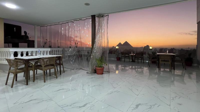 Asser Hotel Pyramids image