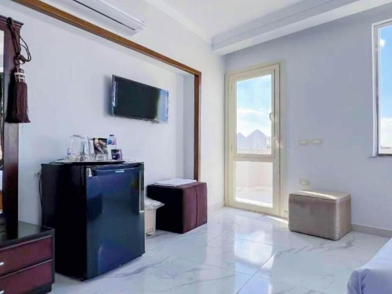 Asser Hotel Pyramids image