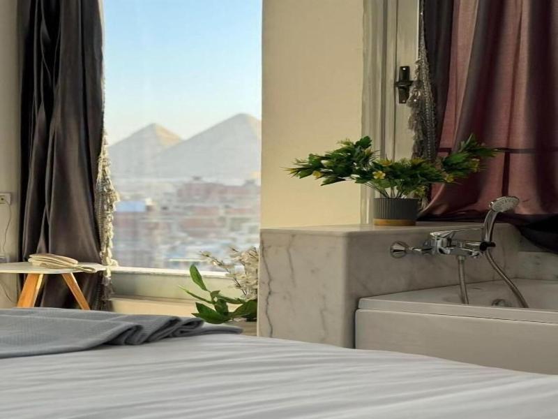 Asser Hotel Pyramids image