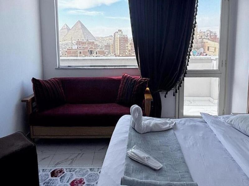Asser Hotel Pyramids image