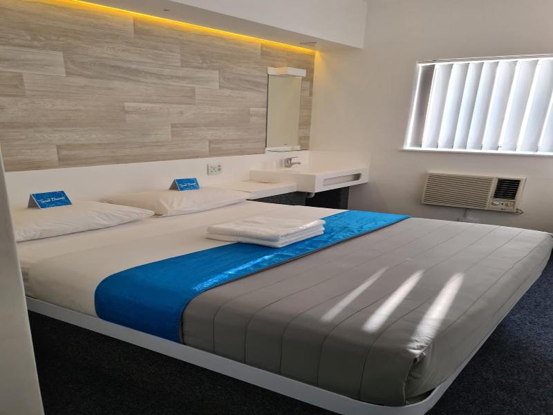 Check Inn Hotel image