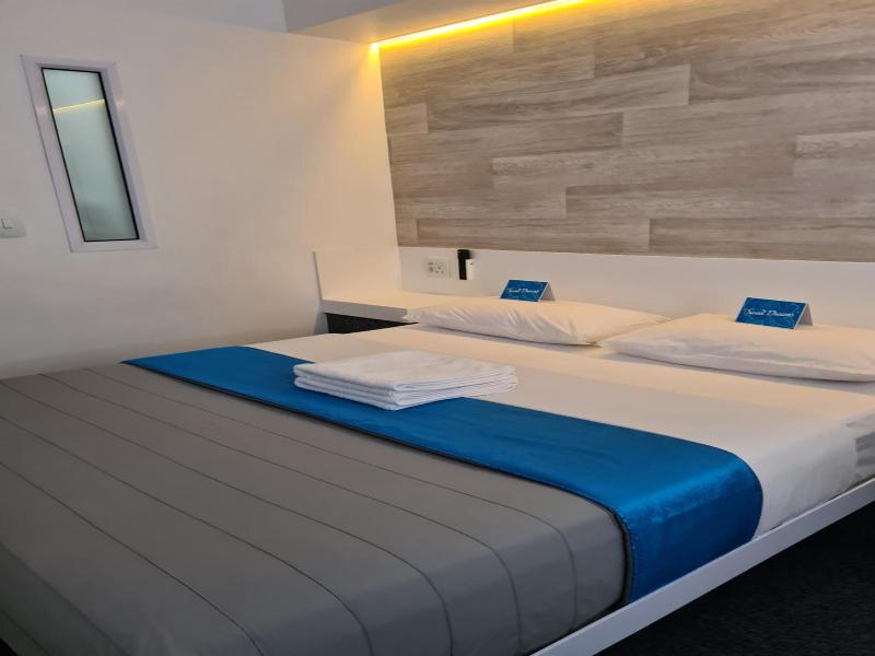 Check Inn Hotel image