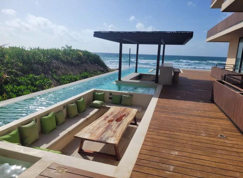 Luxury And Mordern Beachfront Condo By Bt Homes image