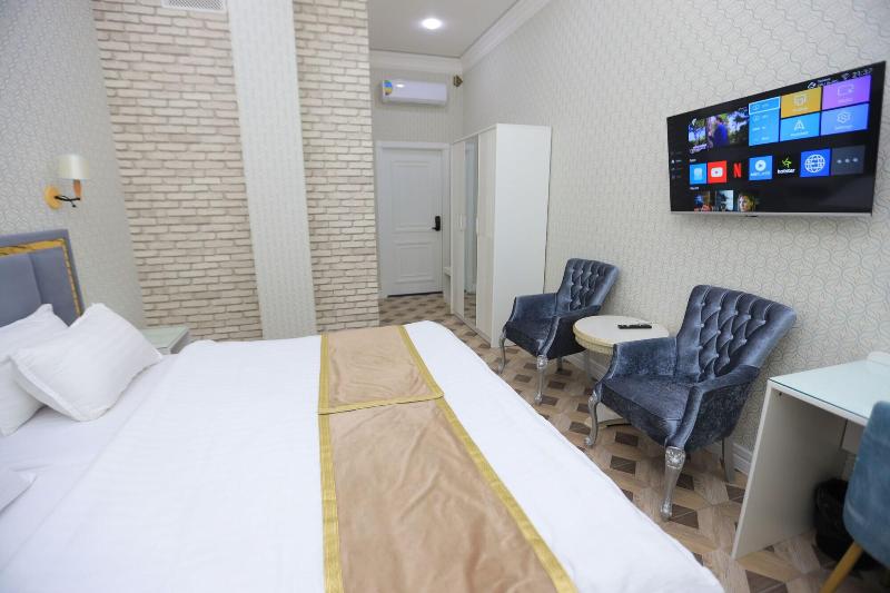 Ayniy Hotel image