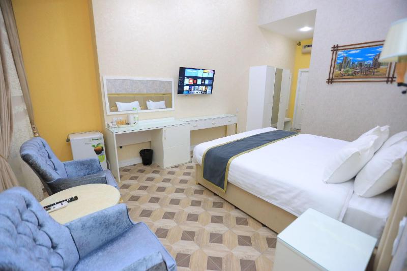 Ayniy Hotel image