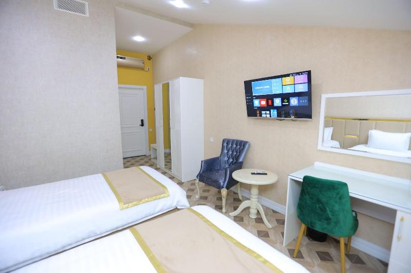Ayniy Hotel image
