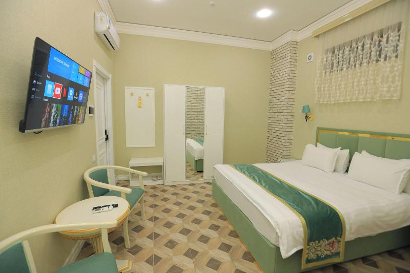 Ayniy Hotel image