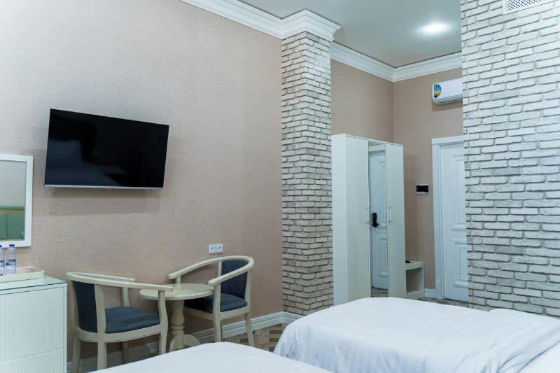 Ayniy Hotel image