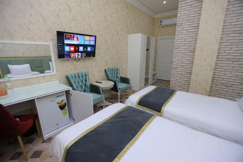 Ayniy Hotel image