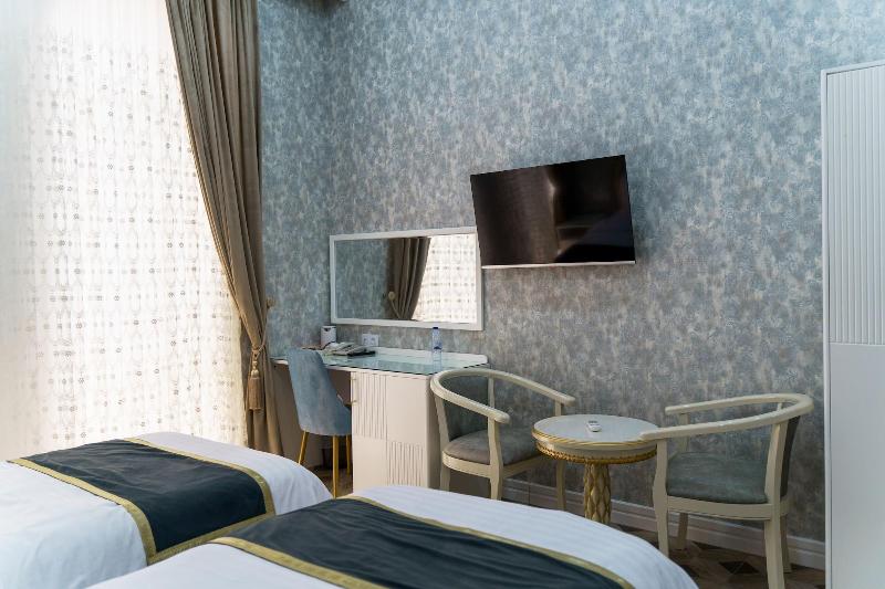 Ayniy Hotel image