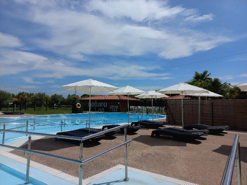 Natura Resorts image