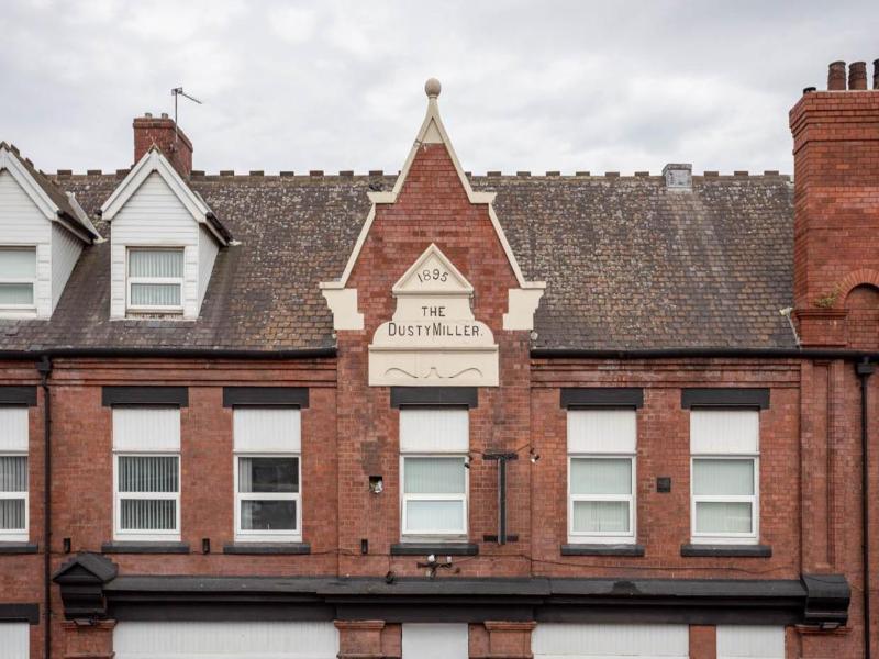 Dusties Hotel image