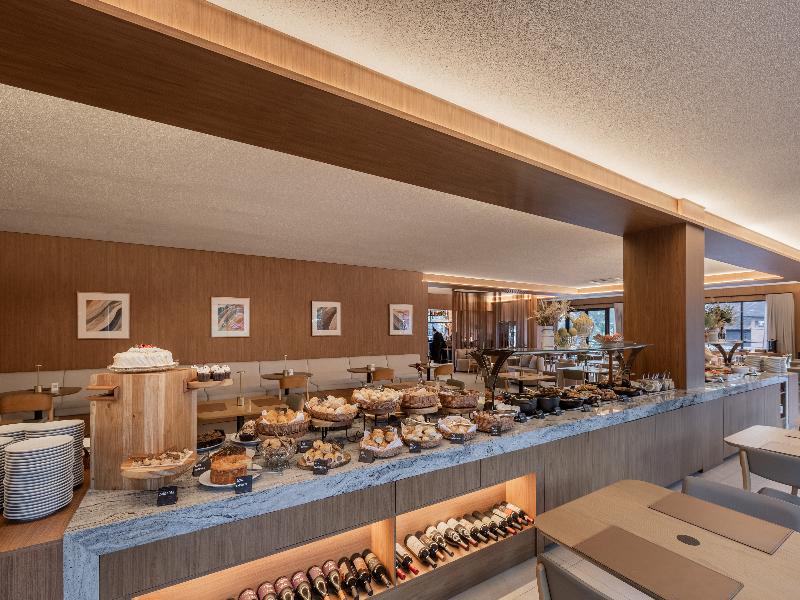 Golden Tulip Canela Oficial