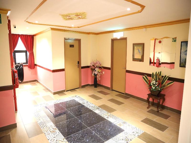 Capital O 90897 Island City Hotel image